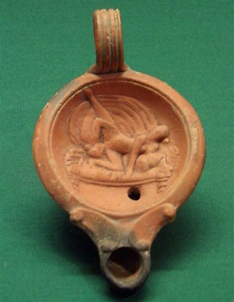 pottery lamp showing two women engaged in oral sex