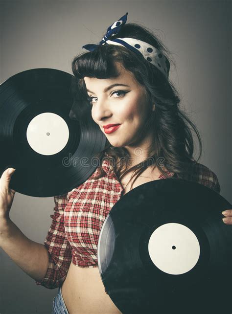 pin up music girl holding vinyl record lp stock image