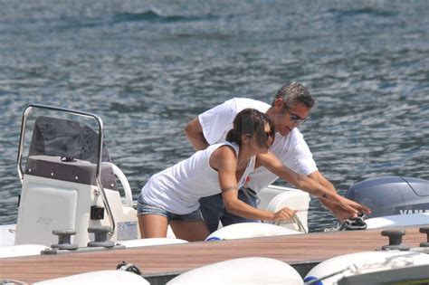 photos of george clooney and elisabetta canalis on boat in