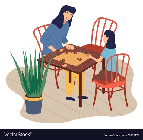 Mother And Daughter Together At Home Playing Table