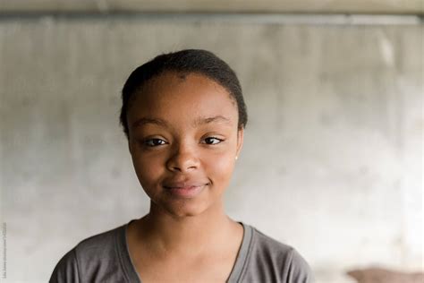 Portrait Of Happy Black Teen Girl By Stocksy Contributor Lea Jones