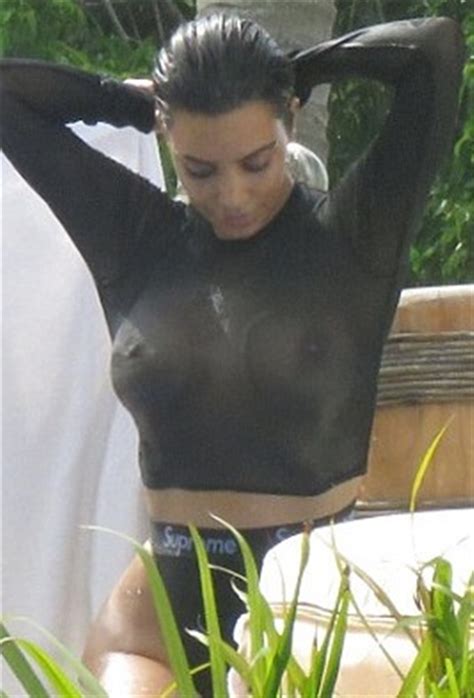 celebrity nude and famous kim kardashian has her big sexy boobs exposed in wet see through