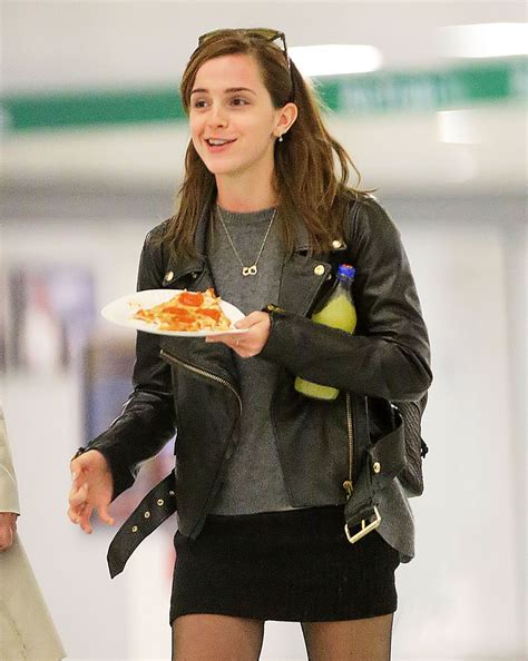 emma watson enjoys a slice of pizza at jfk celebzz celebzz