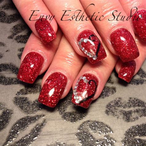 red glitter gel nails envy esthetic studio valentines day nails heat nailart gel nails