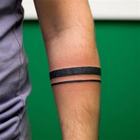 attractive tribal and black armband tattoos for men with meanings in 2020