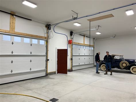 amazing garage  ceilings insulated drywalled heated  air conditioned  high track