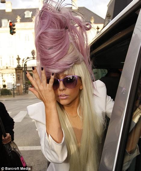 forget the crazy hair what s lady gaga wearing under her jacket singer appears naked daily