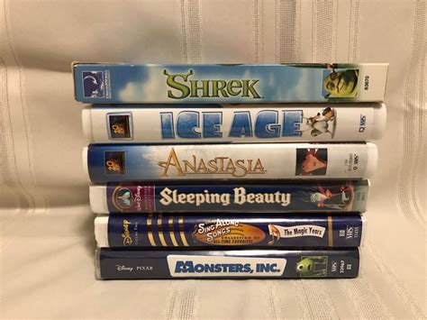 lot   childrens vhs tapes shrek monsters  ice age sleeping
