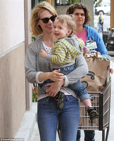 january jones helps son xander try out her sunglasses during a fun grocery trip daily mail online