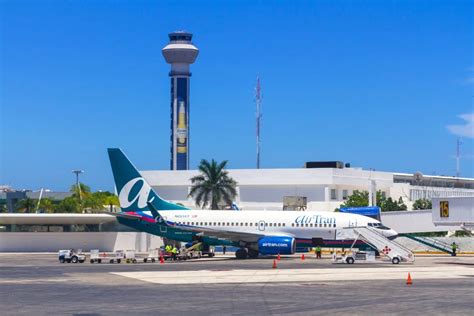cancun international airport sets   daily flights record