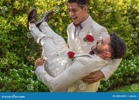 Lgbtq Gay Couple Having Fun Together In Garden In Wedding Ceremony