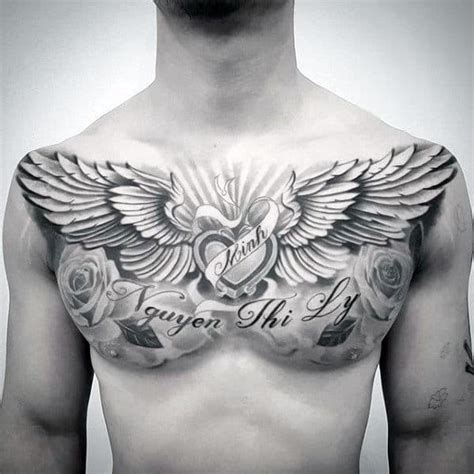 Top 39 Wing Chest Tattoo Ideas [2021 Inspiration Guide]