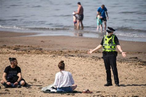 police intervene  crowds gather  beach  hottest day stv news