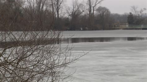 Rescuers See Coat And Pull Woman Out Of Freezing Pond Before She Dies