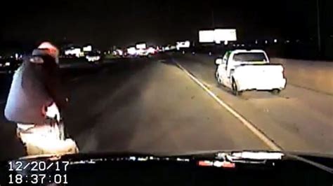 watch dashcam footage shows utah cops shoot moving truck with full