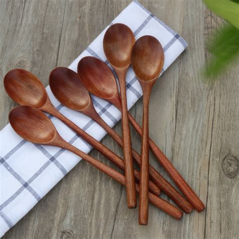 wooden spoons  pieces   wood soup spoons  eating mixing