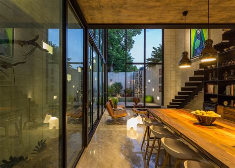 Huge Glass Doors Open Mexican House To A Courtyard Garden
