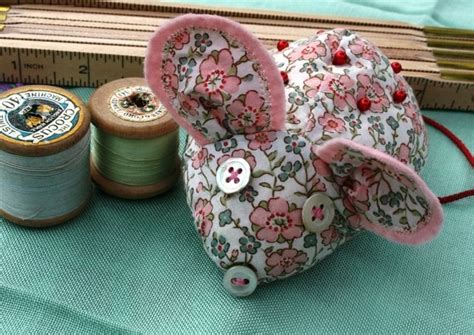 mouse pin cushion liberty tana lawn pink  sewing baskets pincushions love sewing