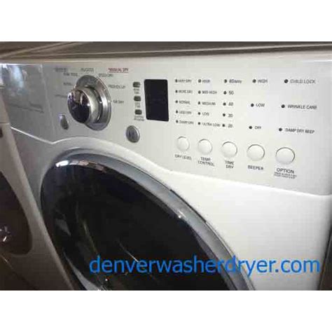 clean lg front load washer  matching dryer stackable
