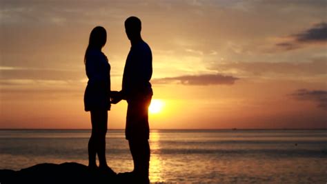 Couple Silhouette At The Beach Stock Footage Video 100