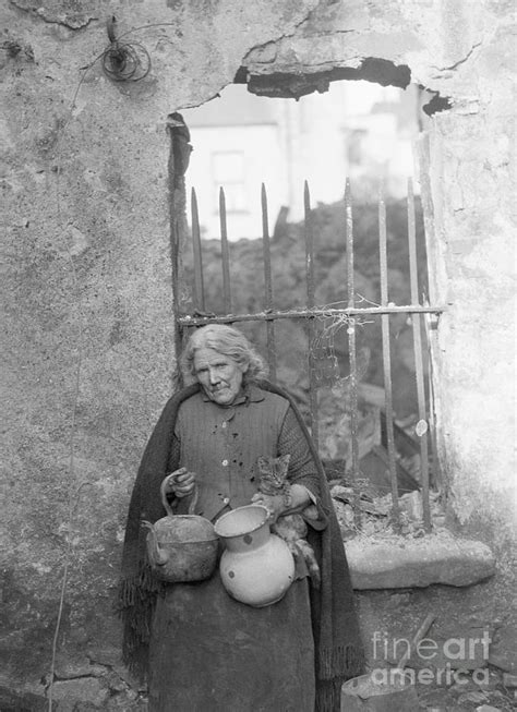 Poor Old Irish Woman Holding Cat Photograph By Bettmann Fine Art America