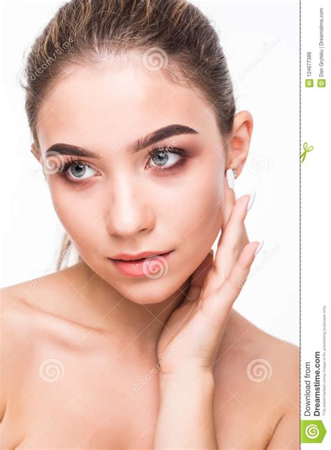 Closeup Beauty Girl Face With Natural Nude Makeup And Clean Skin