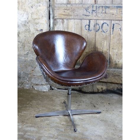 aviator chair swivel  brown leather  metal backed