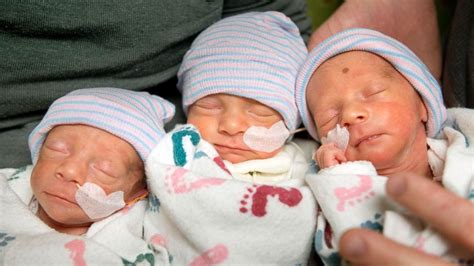 identical triplets conceived  fertility drugs