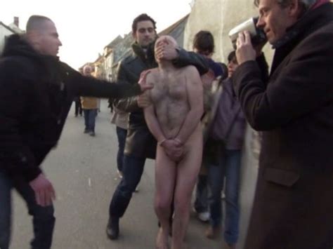 reporter forced to strip naked