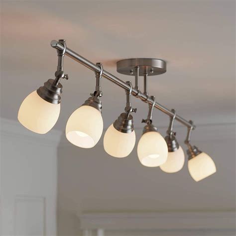 lights  hanging   ceiling   room  white walls