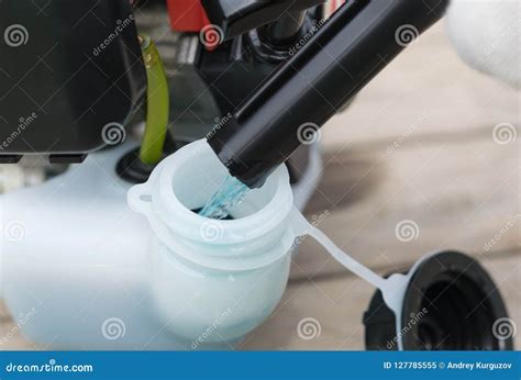 mixture  gasoline  oil poured   work   motor  background close  stock