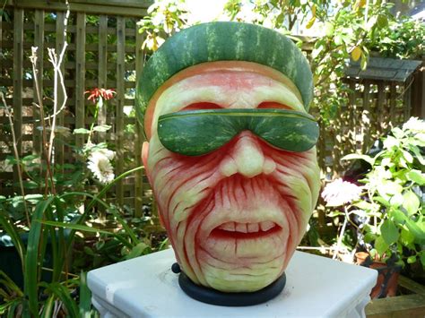 carved watermelon character sculptures  clive cooper