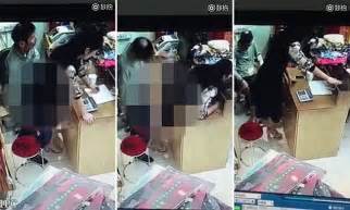 chinese clothing store owner and employee caught on video having sex behind till daily mail online