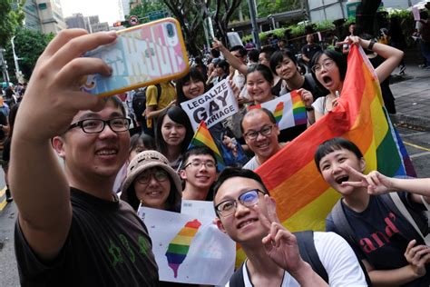 taiwan approves same sex marriage a first in asia pbs newshour