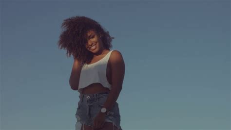 Alone Beauty Mixed Race Black Woman With Huge Curly Hair On Sky