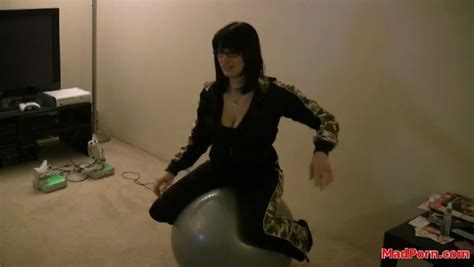 Cutie In Glasses And Tracksuit Balances On Ball Alpha Porno
