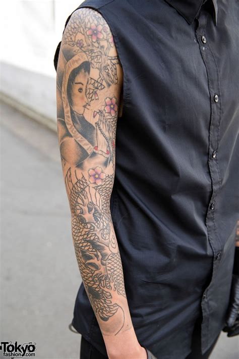 tattooed harajuku guy in black w oz abstract jewelry
