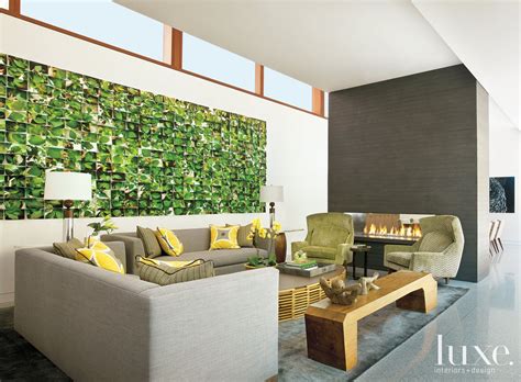 modern white living room  green artwork luxe interiors design