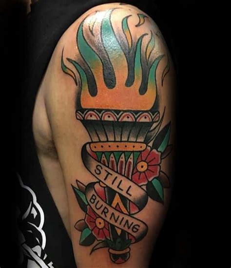 flaming torch tattoo