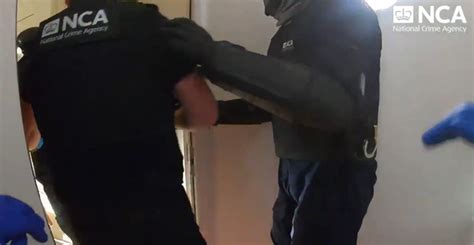 video shows drug cops smashing down door of suspected multi tonne