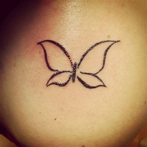 simple butterfly tattoo shape design  female