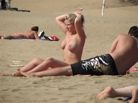 pierced nipples voyeured on beach july 2011 voyeur web hall of fame
