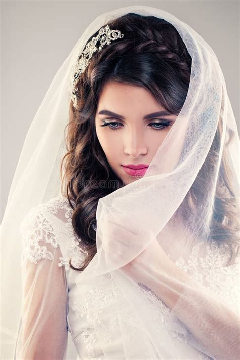 Gorgeous Bride With Fashion Makeup And Wedding Hairstyle Stock Image