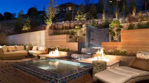 modern outdoor lounge area  water feature  fire pits hgtv