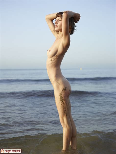 pinkfineart flora naked on the beach from hegre art