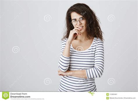 girl wants to hear suggestions being curious during discussion smart attractive curly haired
