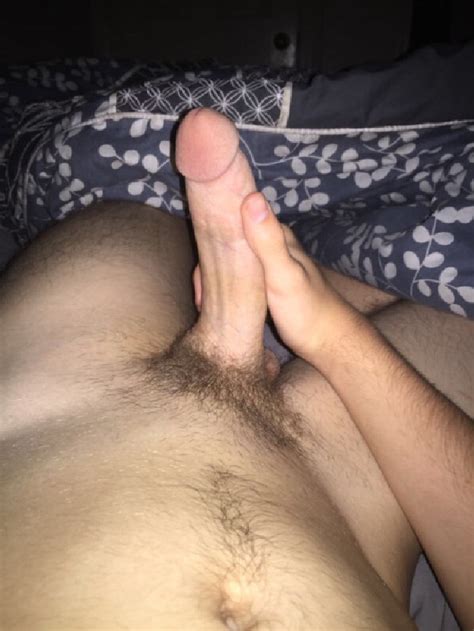 nude man in bed holding his boner horny nude guys