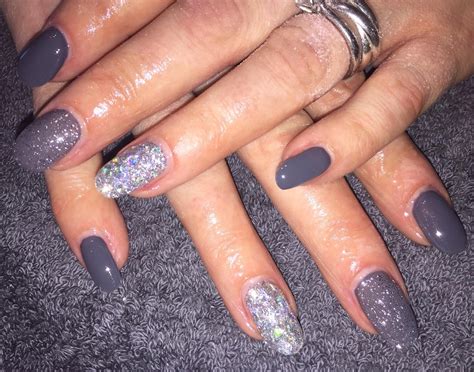 january  dark grey gel nails  silver foil accent grey glitter accent accent nails