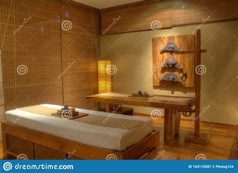 Spa Massage Therapy Room With Massage Therapy Table And Massage Oil
