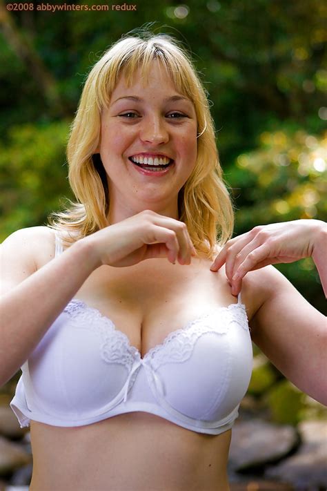 busty blond amateur anneke removes clothes to flaunt big natural tits